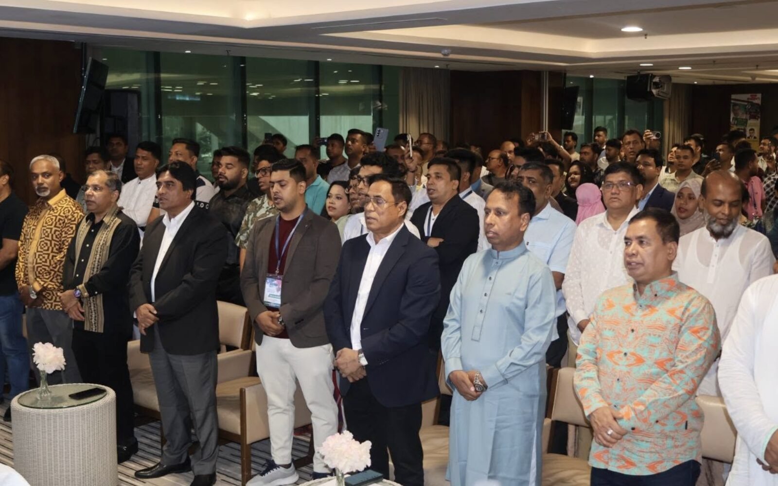Attendees standing together at a community event